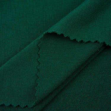 MIYABI acrylic cashmere stretch rib knit fabric close-up with layered fold detail and resilient elasticity for modern knit garments.