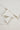 Sand-washed Lenzing modal stretch double knit fabric close-up with layered edge detail and matte texture for refined everyday garments.
