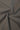 TENCEL linen blend stretch rib knit fabric close-up with drape twist detail and smooth hand feel for lightweight knitwear.