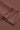 Viscose spandex stretch rib knit fabric close-up with layered fold detail and high elasticity for fitted knitwear and rib trims.