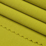 Long staple cotton double knit fabric close-up with surface fold detail and soft hand feel for casual knitwear and spring apparel.