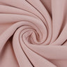 Viscose polyester single jersey fabric close-up with twist detail and fluid drape for spring-summer knitwear and everyday garments.