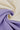 Ecosil biodegradable stretch rib knit fabric close-up with drape twist detail for transitional layering and soft casual garments.
