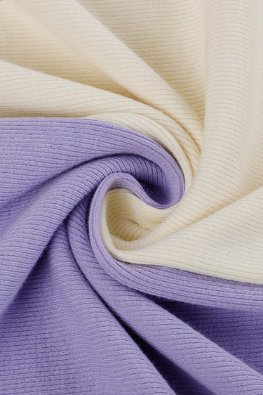 Ecosil biodegradable stretch rib knit fabric close-up with drape twist detail for transitional layering and soft casual garments.