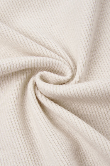 Ecosil biodegradable stretch rib knit fabric close-up with twist detail and flexible texture for everyday comfort garments.