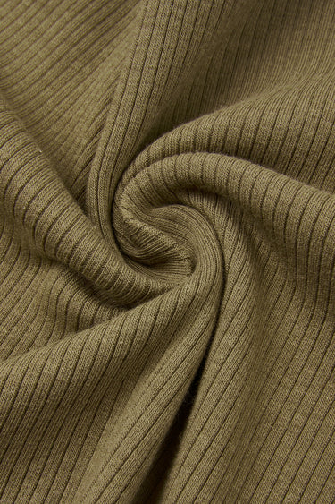Cotton viscose spandex rib knit fabric close-up with twist detail and soft stretch texture for comfortable knit garments.