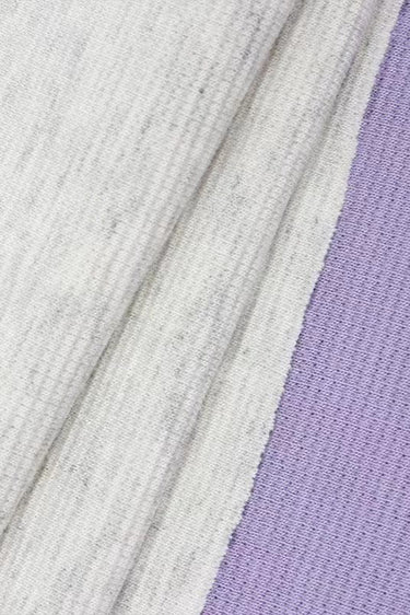 Ecocosy textured double-face step knit fabric close-up with double-side edge detail and stable structure for structured knitwear.
