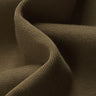 Cotton SCUBA spacer knit fabric close-up with curved drape detail and smooth texture for everyday garments.
