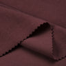 Ecocosy antibacterial acrylic cashmere fleece knit fabric close-up with folded edge detail and soft micro-fleece texture for modern casualwear.