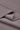 Double-sided stretch knit fabric close-up with folded edge detail for comfortable layering garments.