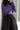 TENCEL wool merino stretch rib knit fabric shown in a long-sleeve top for next-to-skin comfort and premium base layers.
