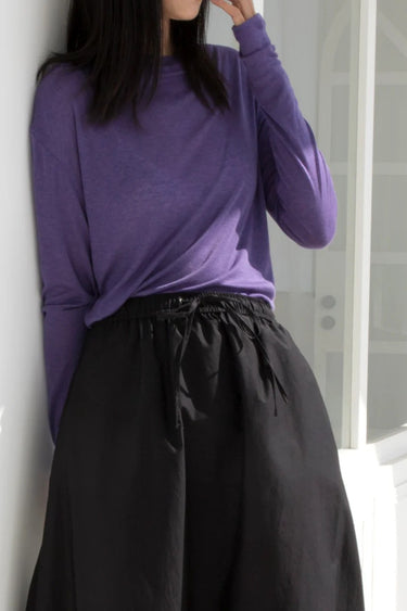 TENCEL wool merino stretch rib knit fabric shown in a long-sleeve top for next-to-skin comfort and premium base layers.