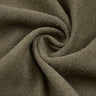 Cotton polyester terry knit fabric close-up with twist detail and soft terry texture for casualwear and sportswear.