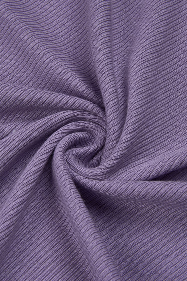 Merino wool elastane double-face rib knit fabric close-up with twist detail and dimensional rib texture for comfortable seasonal knitwear.