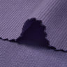 Stretch double-face step knit fabric close-up with edge structure detail and subtle textured surface for modern casual garments.