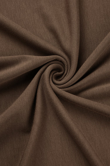 Rayon nylon blend stretch rib knit fabric close-up with twist detail and flexible texture for everyday garments and close-fitting apparel.