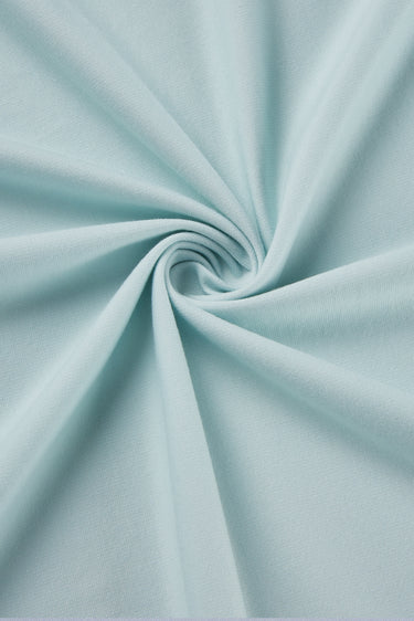 Stretch double knit base fabric close-up with twist detail and soft texture for comfortable modern knitwear.