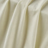 Cotton blend stretch single jersey fabric close-up with surface drape detail and soft dry touch for base layers and underwear.