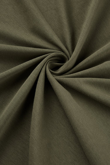 Cotton blend stretch single jersey fabric close-up with twist detail and lightweight texture for comfortable base layer garments.