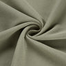Quick-drying piqué knit fabric close-up with twist detail and subtle textured surface for polo shirts and casual tops.