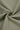 Quick-drying piqué knit fabric close-up with twist detail and subtle textured surface for polo shirts and casual tops.