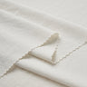 Sand-washed Lenzing modal stretch double knit fabric close-up with folded edge detail for modern knitwear and everyday lifestyle garments.