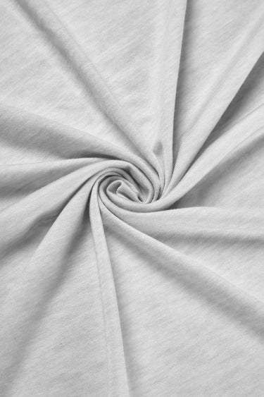TENCEL wool blend stretch single jersey fabric close-up with twist detail and smooth texture for next-to-skin comfort.