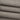 HEAT-FLOW fleece knit fabric close-up with soft surface texture for thermal tops and sweatshirts.