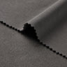 Mousse rib knit fabric close-up with edge structure detail and soft surface texture for casualwear.