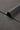 Mousse rib knit fabric close-up with edge structure detail and soft surface texture for casualwear.