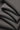 Mousse rib knit fabric close-up with folded drape detail and smooth hand feel for soft knit garments.