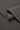 Mousse rib knit fabric close-up with folded edge detail for modern casualwear and comfortable knit garments.