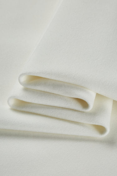 HEAT-FLOW fleece knit fabric close-up with folded stack detail for sweatshirts and cold-weather knitwear.