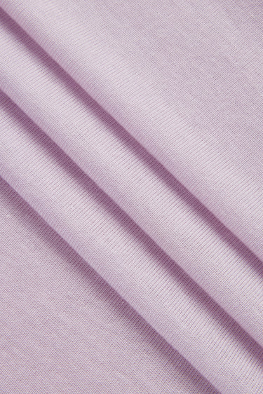 TENCEL wool blend stretch rib knit fabric close-up with folded detail and smooth hand feel for next-to-skin garments.