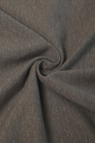 TENCEL linen blend stretch rib knit fabric close-up with drape twist detail and smooth hand feel for lightweight knitwear.