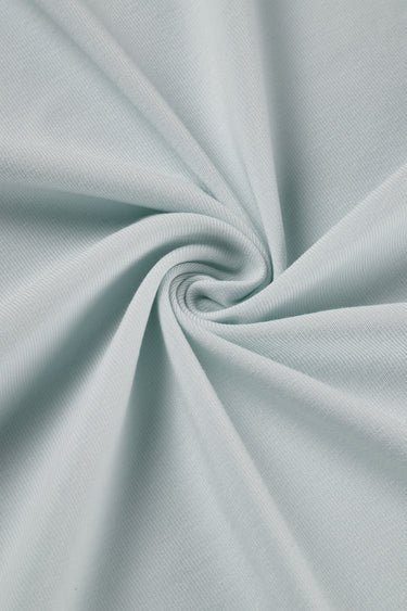 Mousse rib knit fabric close-up with twist detail and soft texture for comfortable knit garments.