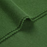 Merino wool blend mousse knit fabric close-up with edge structure detail and soft micro-fleece texture for casualwear.