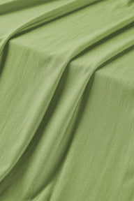 Cloudure Lyocell stretch rib knit fabric close-up with surface drape detail and smooth hand feel for modern knitwear and casual tops.