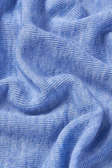 Lycra TENCEL wool stretch rib knit fabric close-up with surface drape detail and soft stretch comfort for base layers.