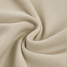 Cotton double knit fabric close-up with twist detail and soft texture for everyday garments and lightweight layering.